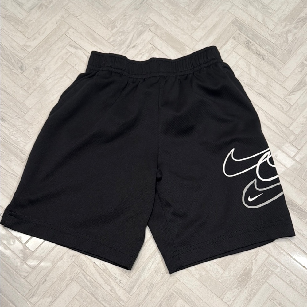 Black Nike Shorts with White Swoosh Design, kids 7